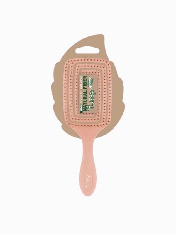 Cepillo mini antinudos de fibra natural Fussy Green naranja en su blíster