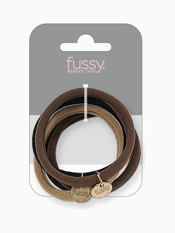 Gomas de pelo de tela Fussy en su blíster
